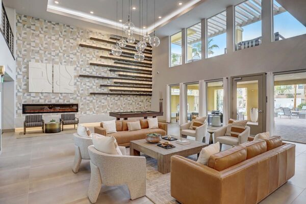 Aspire at Echelon apartments social club with plush seating, fireplace, and elegant decor.
