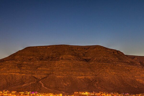View of mountains surrounding Las Vegas city at dusk from Tesora apartments.