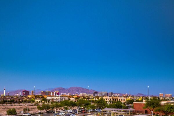 View of mountains surrounding Las Vegas city at dusk from Tesora apartments.