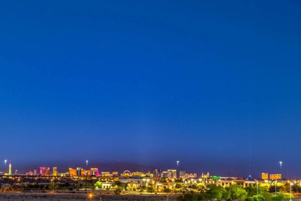 View of mountains surrounding Las Vegas city at dusk from Tesora apartments.