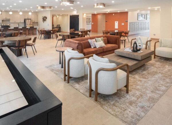 Game room with comfortable plush seating.