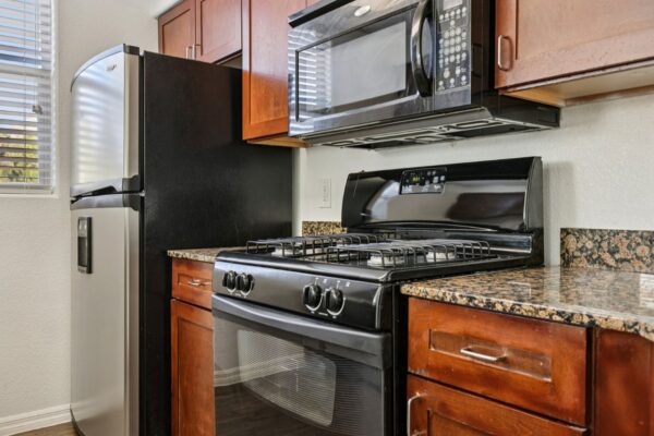 Altessa-Apartments-Unit-3106-Kitchen-Stove-and-Fridge