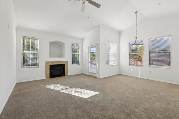 Altessa-Apartments-Unit-3106-Living-Room-With-Fireplace-and-Dinning-Room