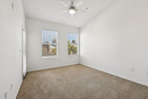 Altessa-Apartments-Unit-3141-Bedroom-With-Two-Windows-and-Balcony-Access