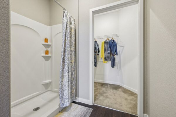 Elevate-Apartments-Model-Bathroom-Shower-and-Walk-In-Closet