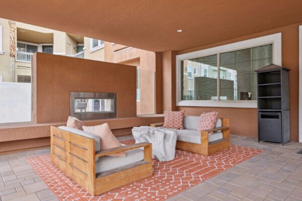 Elevate-Apartments-Outdoor-Lounge-Area-With-Fireplace-2