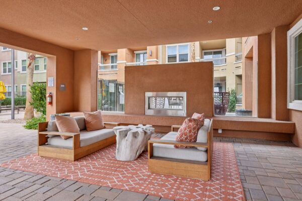 Elevate-Apartments-Outdoor-Lounge-Area-With-Fireplace