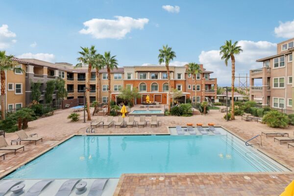 Elevate-Apartments-Pool-and-Spa-Area-With-Loungers