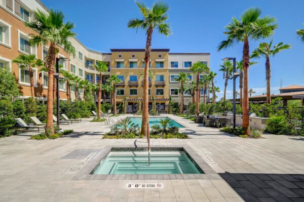 Heirloom-at-Pebble-Affordable-Apartments-Pool-and-Spa-With-Loungers-and-Grill-Area-2